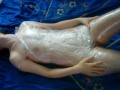 Details : Eingewickelte Frauen Folie Klebeband Mumifizierung
